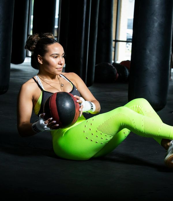 Woman feeling energetic and balanced during a light cardio workout.